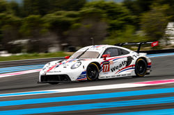Porsche coming down a hill.