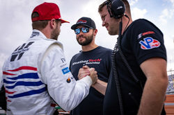 Drivers after winning pole.