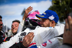 Drivers hugging post race.