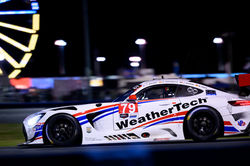 Mercedes by the ferris wheel.