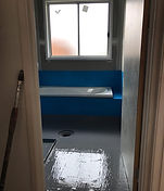 Blue waterproof membrane applied to shower recess