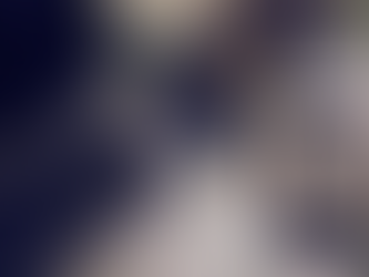 A messy table with a laptop, a couple of cups of coffee, a sticky note, and a phone opened to the calendar - representing how chaotic holiday planning can be with the use of technology.