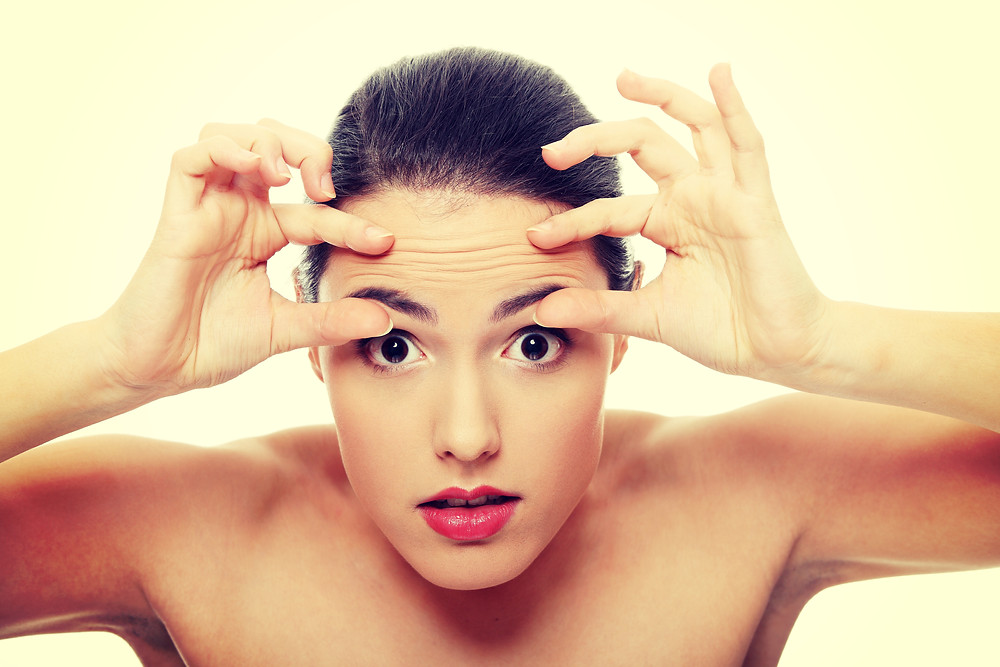 young girl with aging skin
