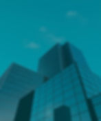 Vista a perspectiva de unos edificios modernos con fachada de vidrio