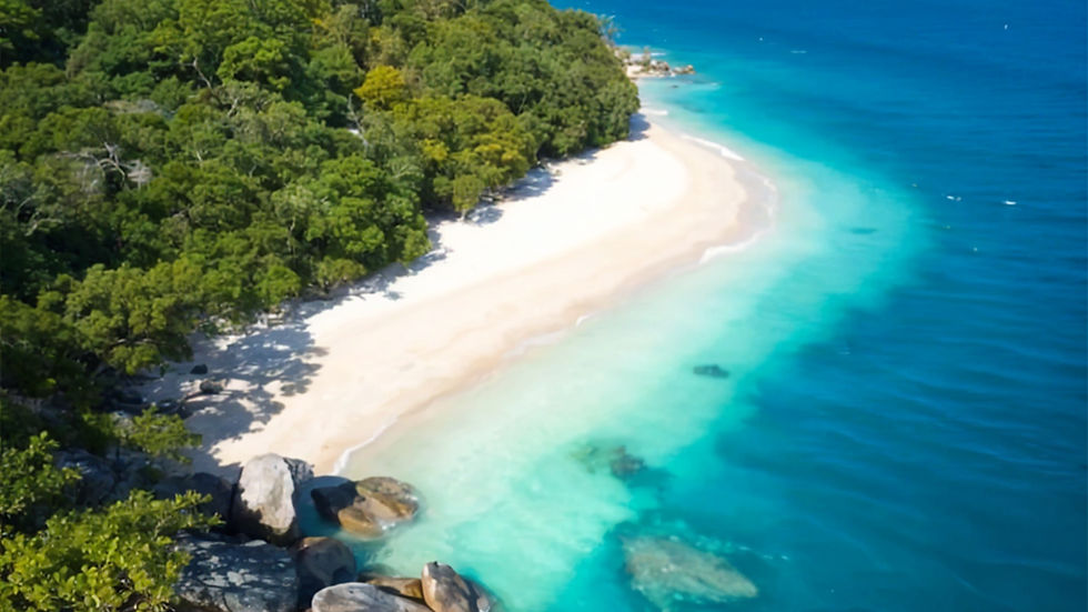 High angle view of a serene beach on Fitzroy Island with clear blue water