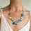 Miniaturbild: CURA Jewellery - Flower & Heart Charm Necklace (Multicolour Blue)