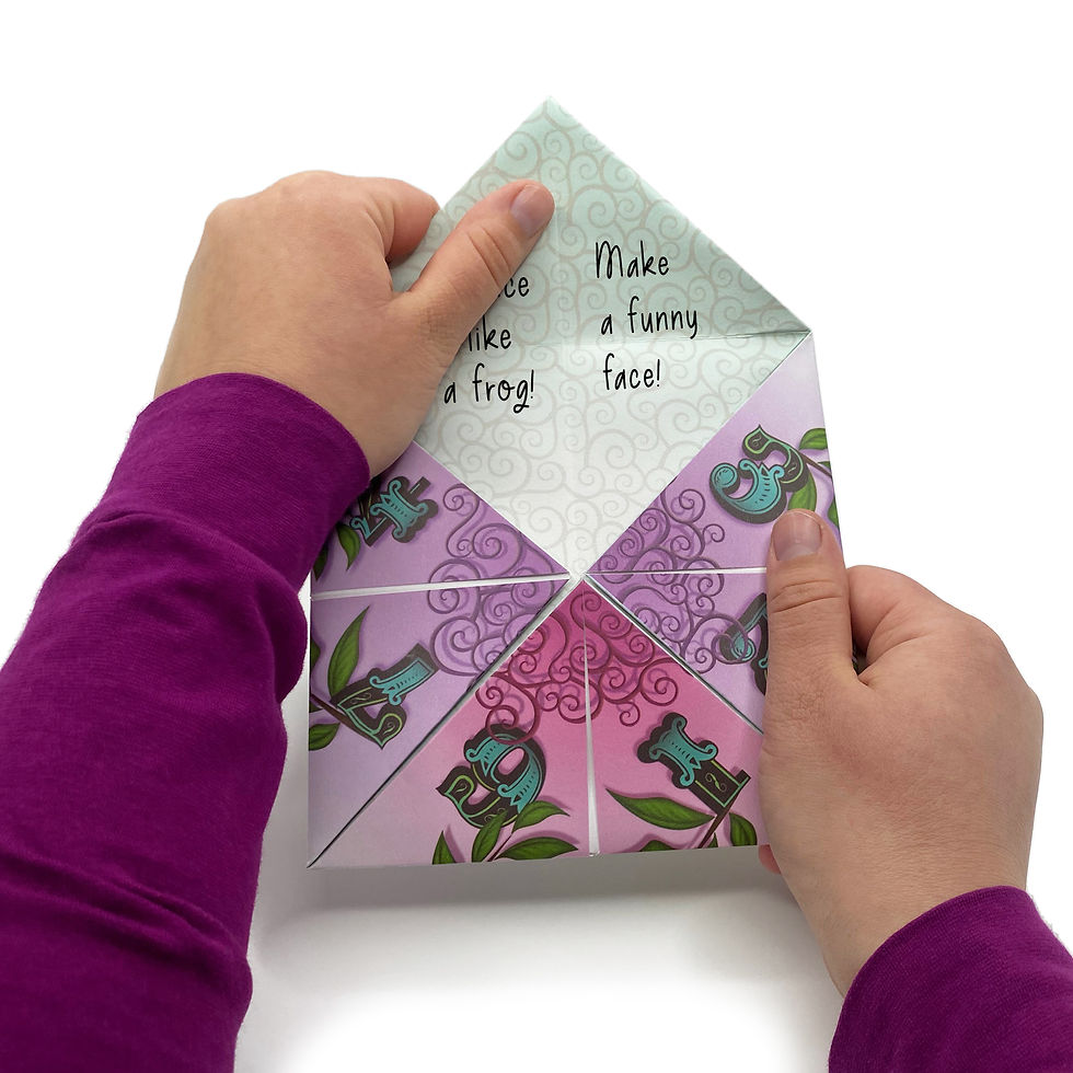 Miniatyrbild: Reading messages in a 3D pop-up chameleon's origami cootie catcher card.