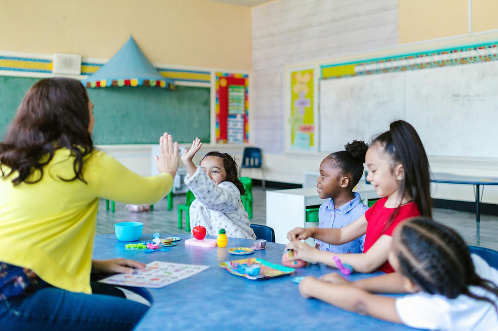 Early childhood educator working with young children at an early learning centre in Hawke’s Bay, New Zealand