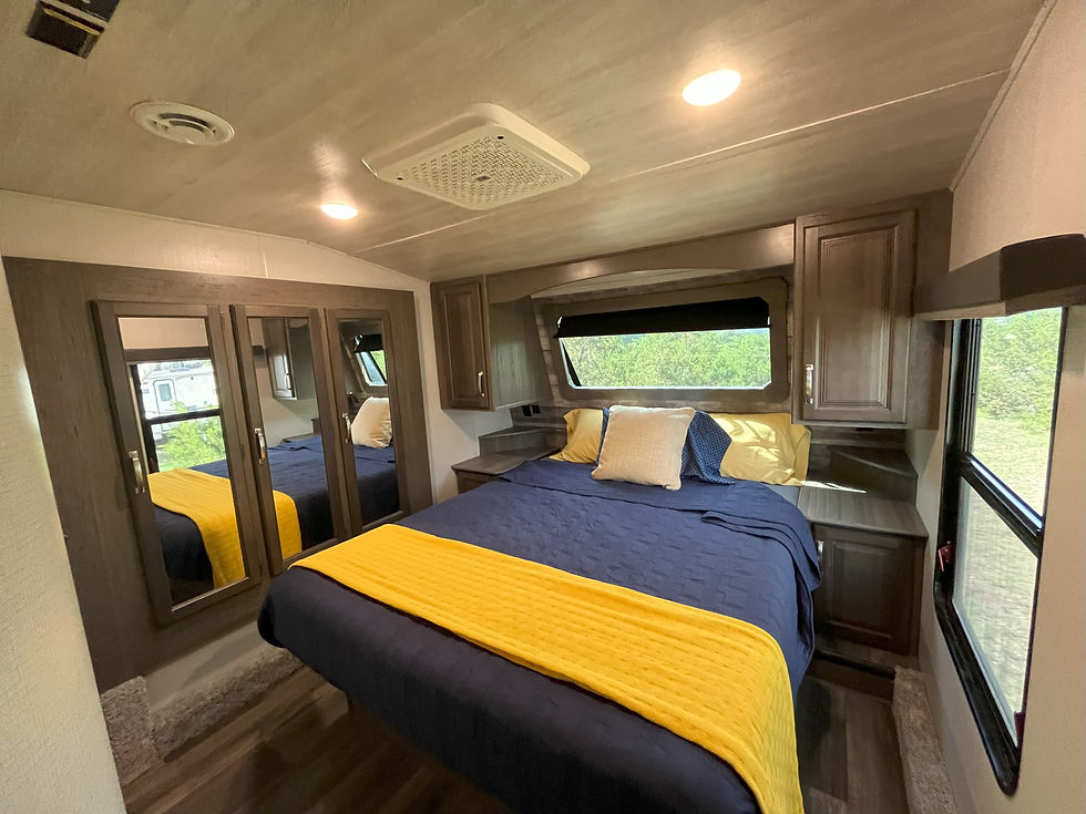 Queen bedroom in The Firefly luxury camper
