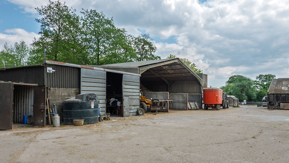 Path continues through the farmyard