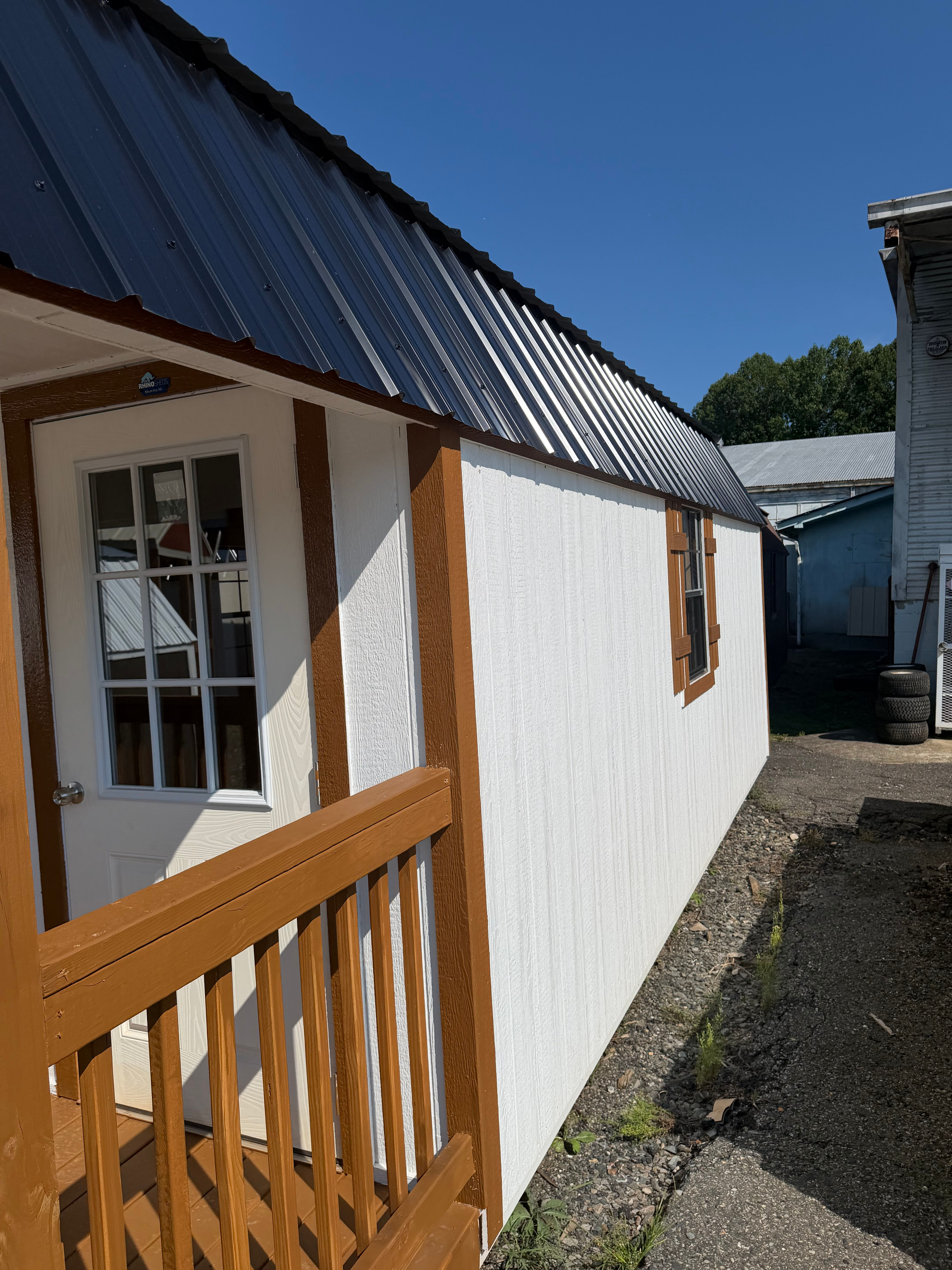 10'x24' Barn Lofted Cabin Black Roof, White Siding, Butternut Trim
