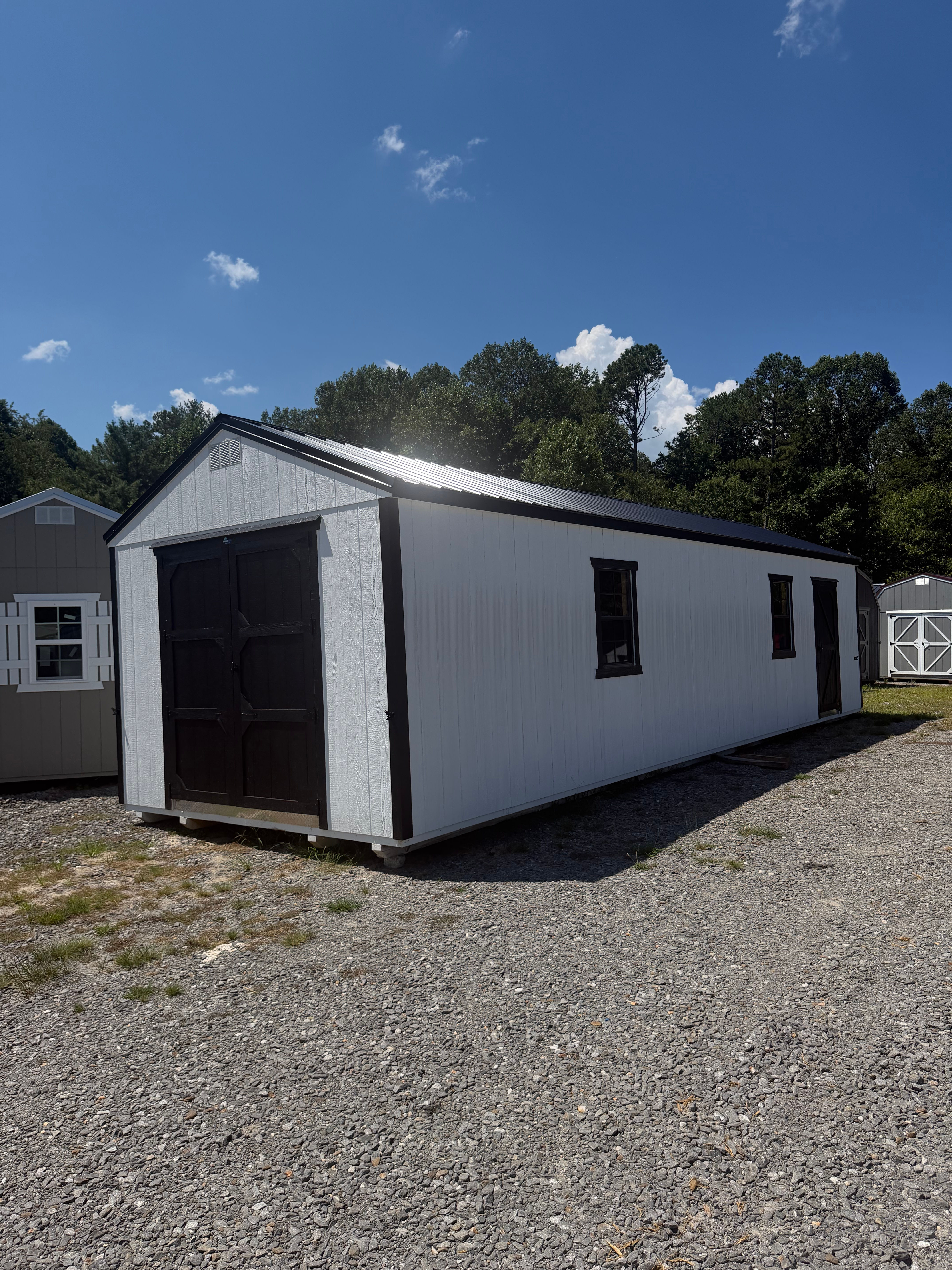12’x36’ Side Utility Black Roof, White Siding, Black Trim,