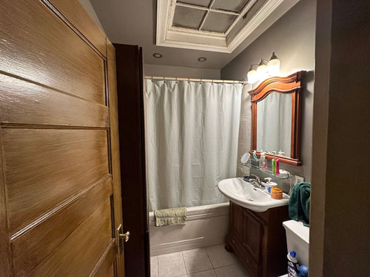 Original powder room before luxury bathroom remodeling and custom finish installation