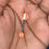 Miniatura: Spiked Orange And White Tongue Ring