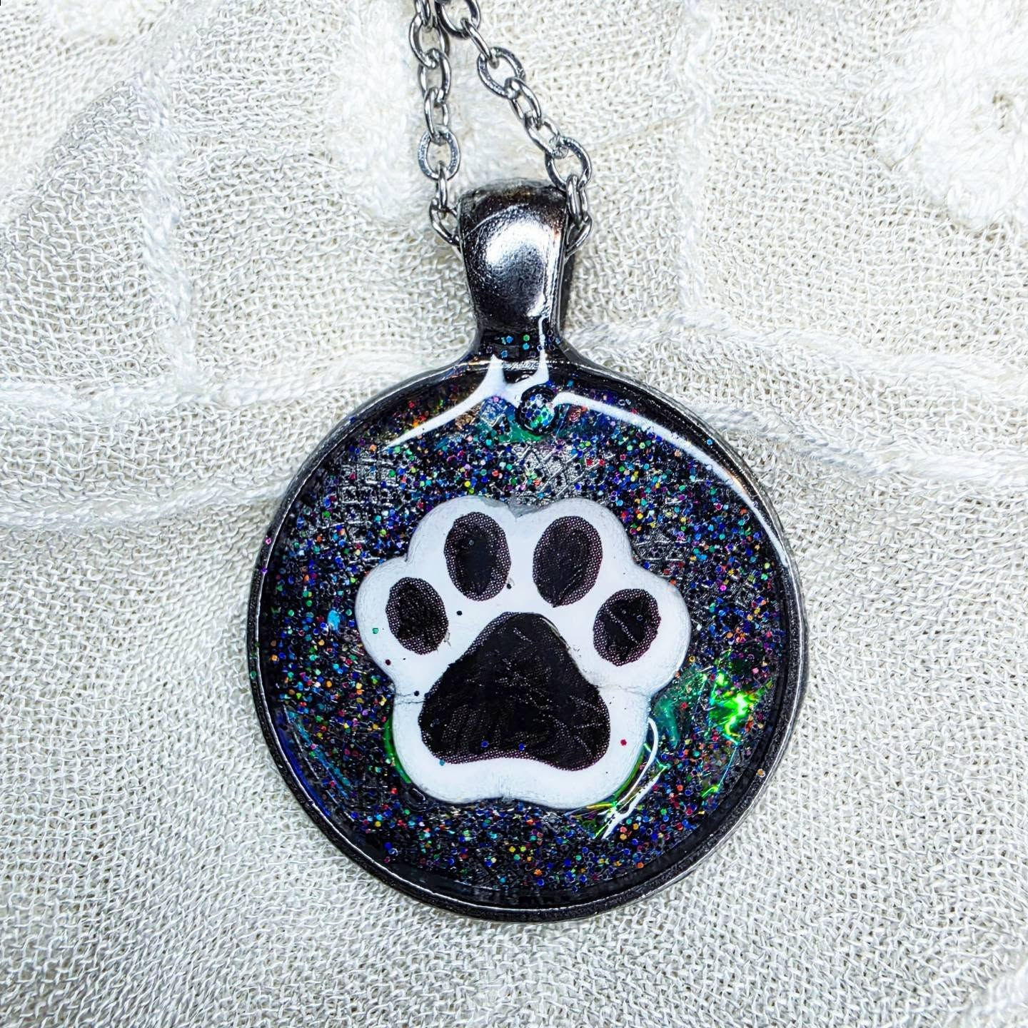 Black Psychedelic Paw Print necklace