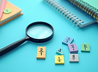 magnifying glass and fraction tiles