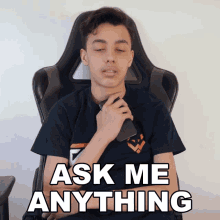 Picture of a boy sittilng in a chair with the label "ask me anything"73629.gif