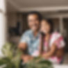 Hawaiian dad and daughter smiling in a clean house, from a distance.jpg
