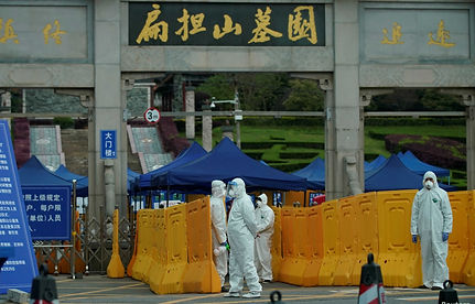 reuters_china_wuhan_cemetary_01Apr20.jpg
