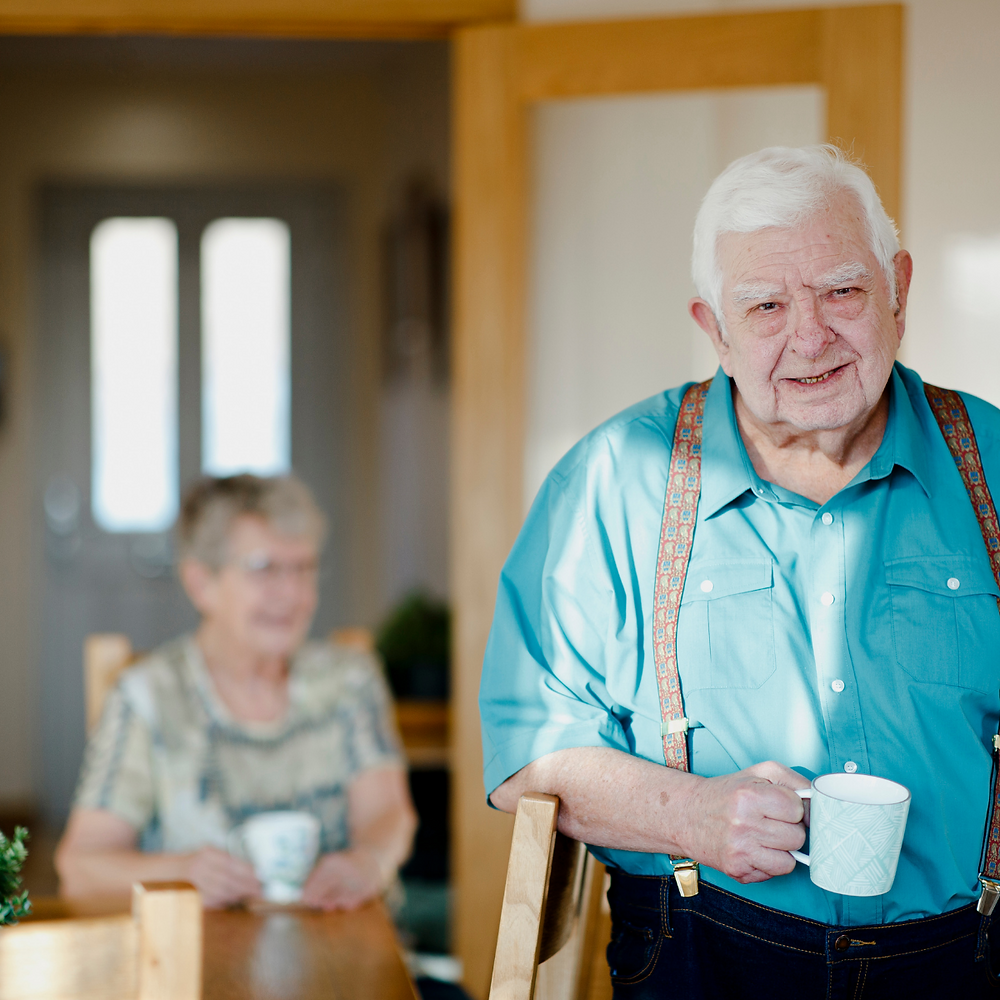 Photo of elderly couple drinking tea