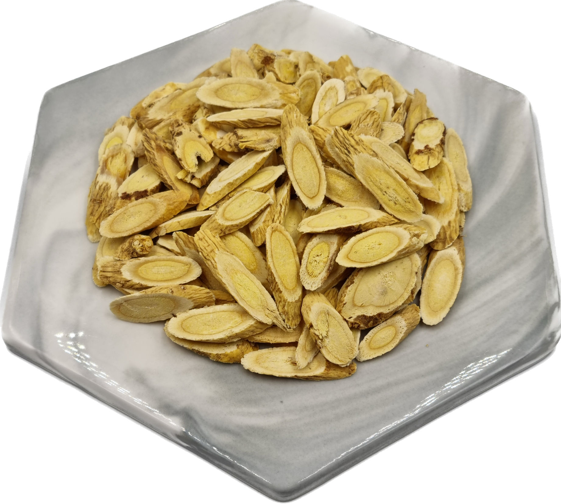 astragalus root slices on marble plate