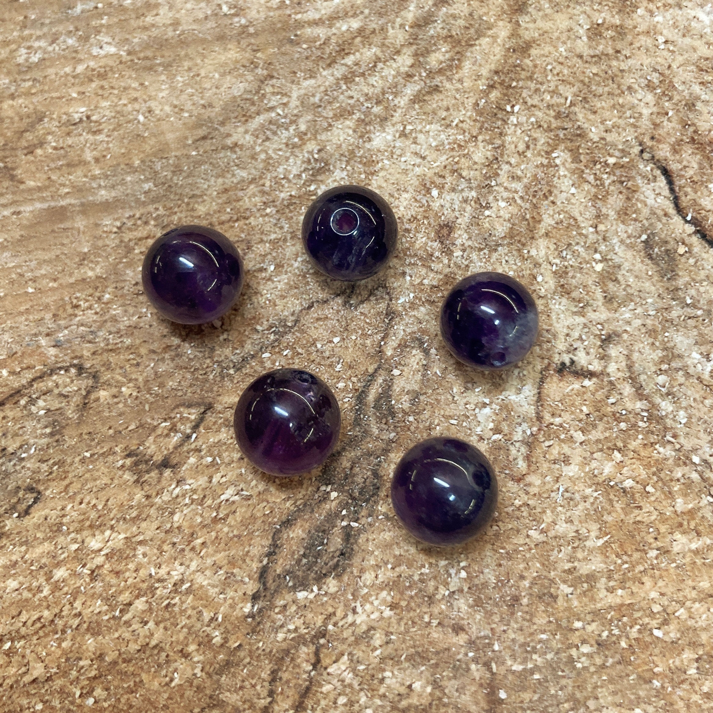 Perle 8/8.5mm - améthyste "Extra" foncée