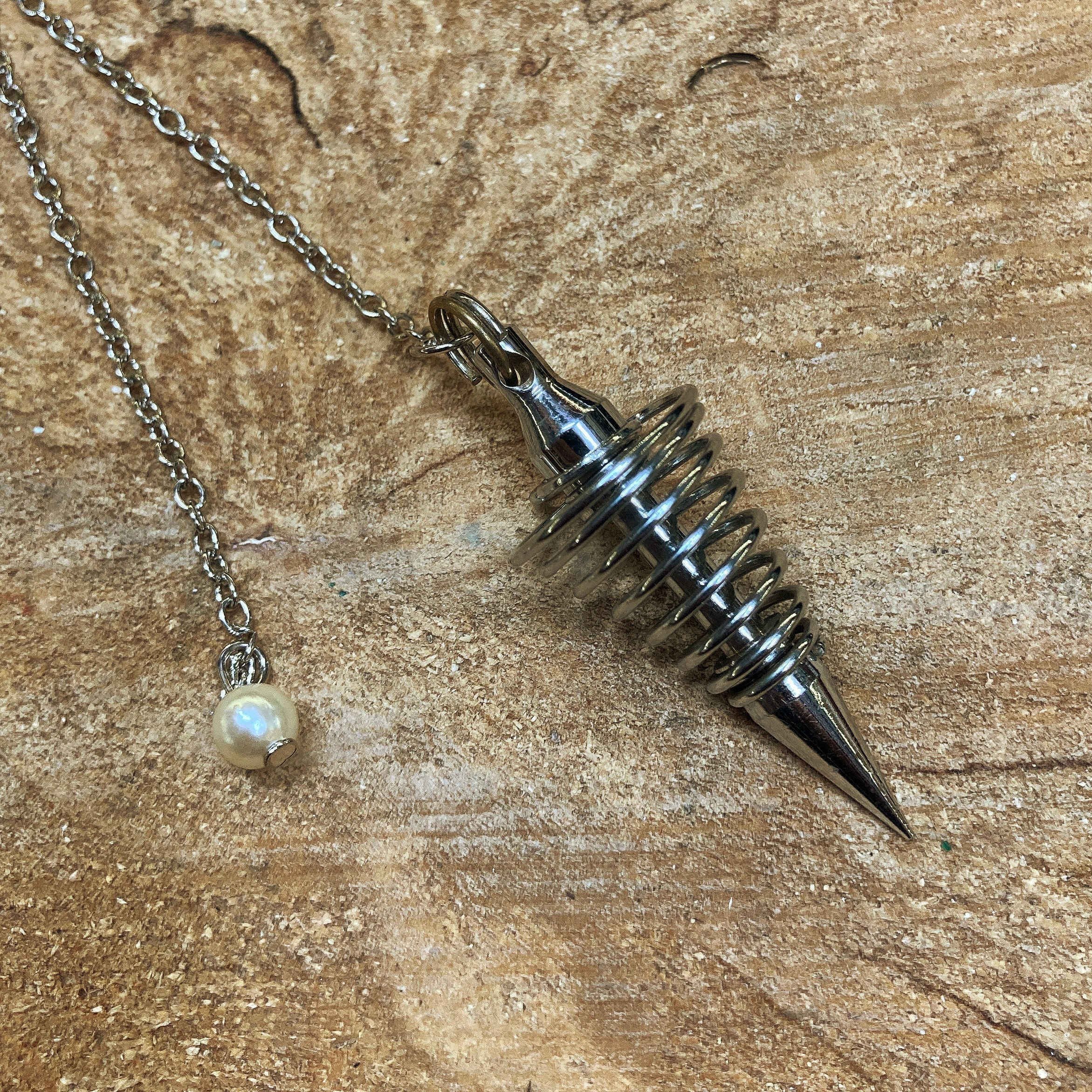 Pendule - Spirale argentée