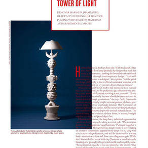 AD India Tower of Light spread featuring the Asteroid stacked terracotta floor lamp on a blue background