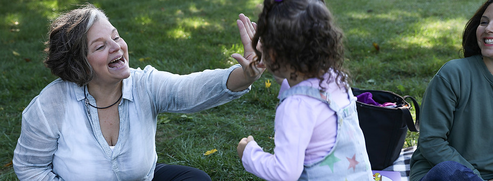 Jenny and child high five