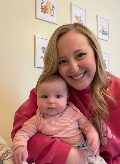 teacher holding a baby
