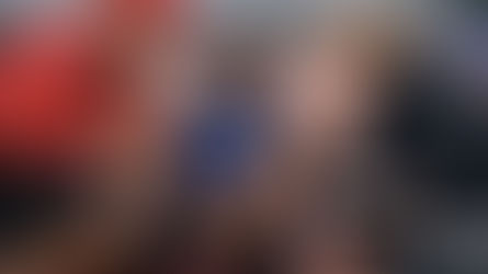 Injured athlete communicating with physiotherapist and coach