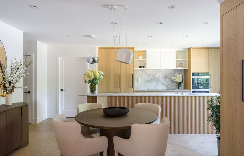 The Centaurus Project by Dimora Interiors in Vancouver showcases modern oak cabinetry, marble accents & custom design.