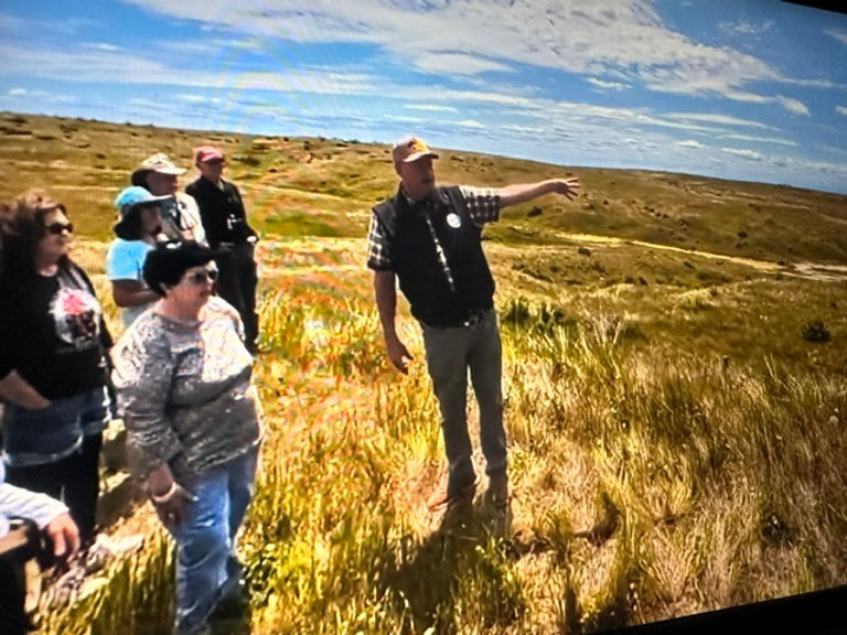 Ken Woody with tour group viewing behind Last Stand Hill