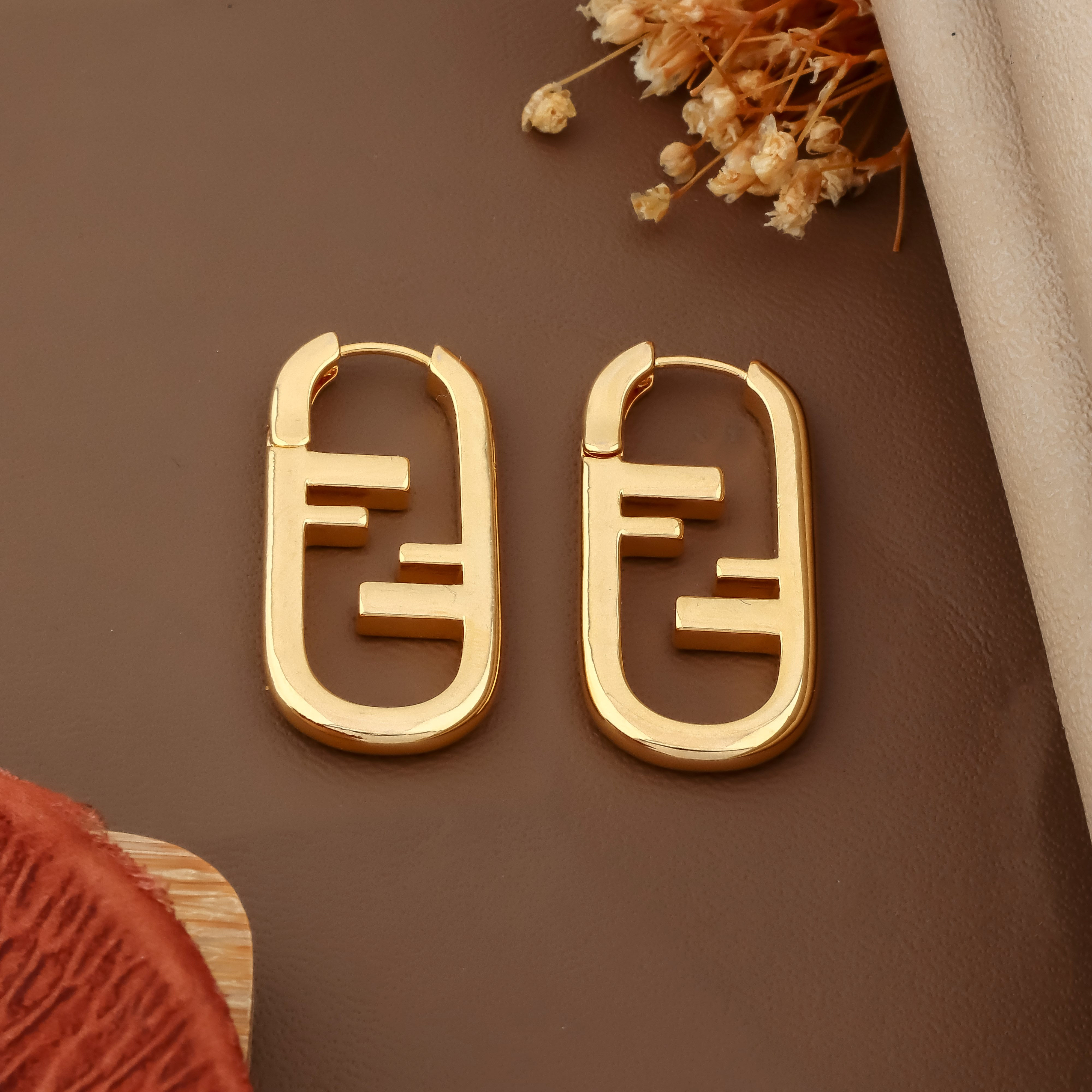 Gold Tone Architectural Infinity Hoops