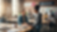 Mentor and young person having a conversation in a community centre
