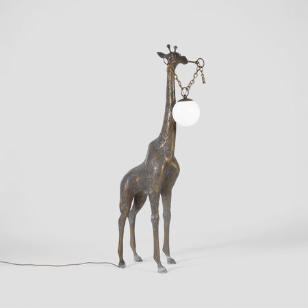 Massive vintage solid brass giraffe sculpture boasts form and functionality with a lamp controlled by a cleverly disguised dimmer switch hidden in the horn
