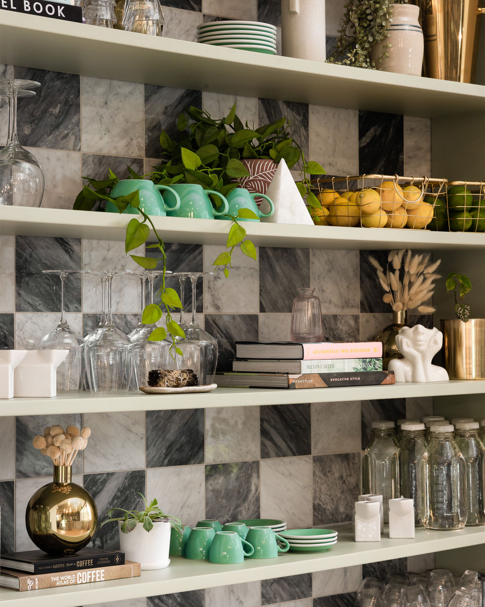 Gypsy Cup shelving detail with dishware and checkered tile backdrop, Gilbert, Arizona.