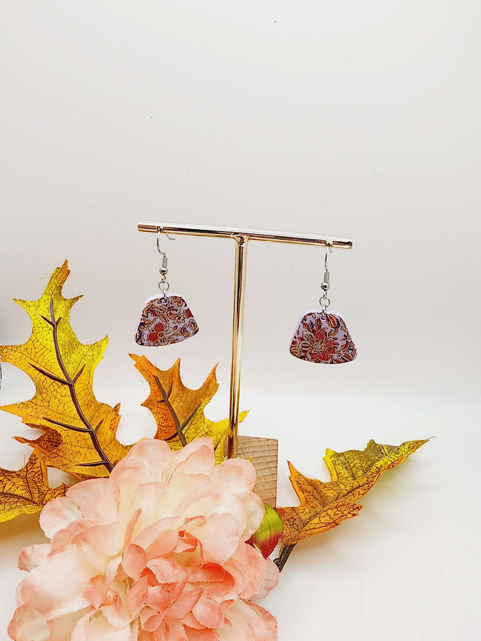 Red and white floral earrings