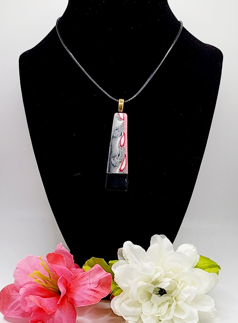 Handcrafted black and white necklace with unique pendant