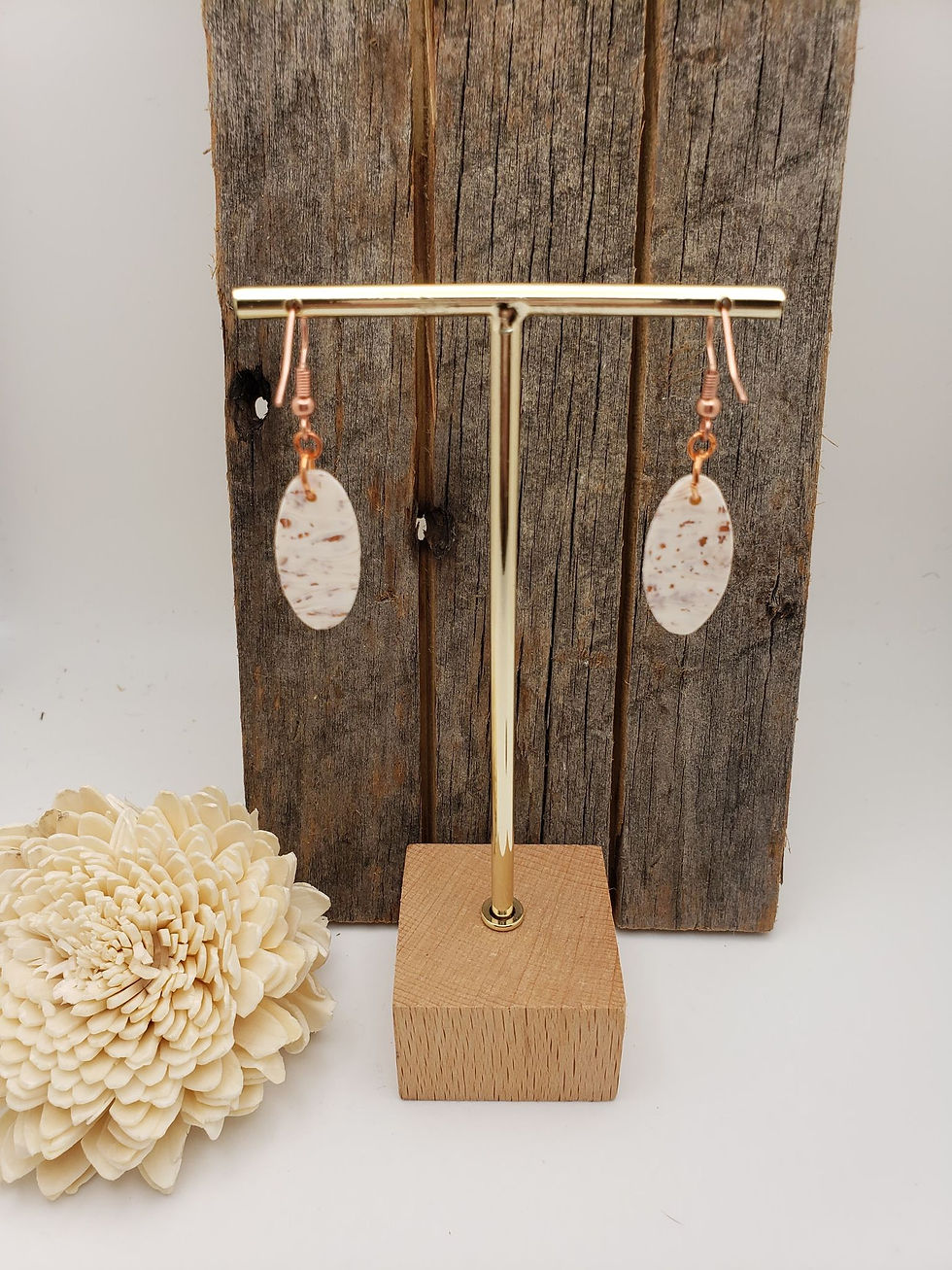 Oval rose gold leaf earrings