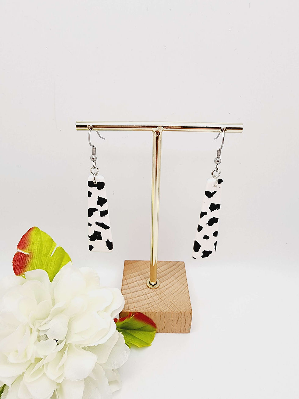 Black and white cow print earrings