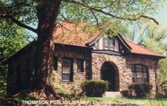 Thompson, CT public library, built of stone with half-timbering.