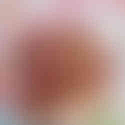 a plateful of biscuits with poppy shaped fondant on them