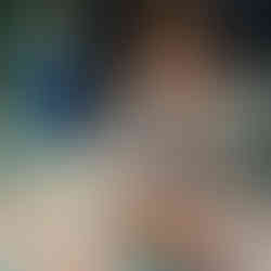 a little boy is making a fruit kebab using various pieces of fruits