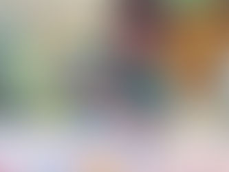 a little boy is squeezing lemon juice onto his pancake