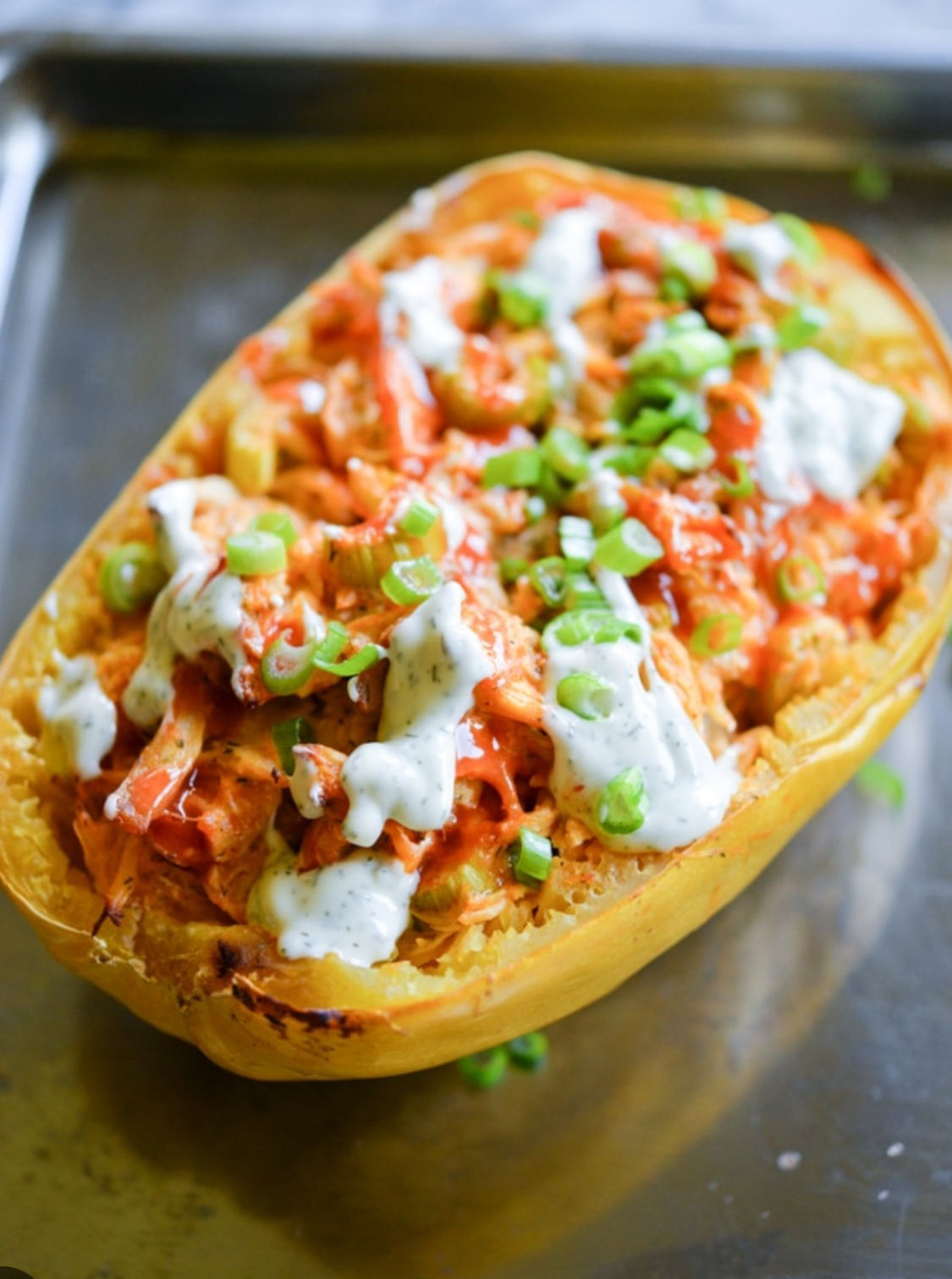 Spaghetti squash with buffalo chicken and cheddar