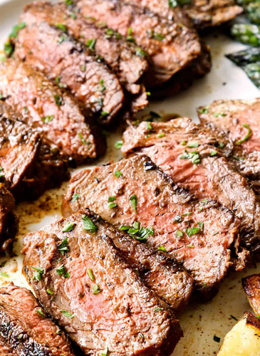 Herb crusted sliced shell steak with roasted tomatoes | Down To Earth