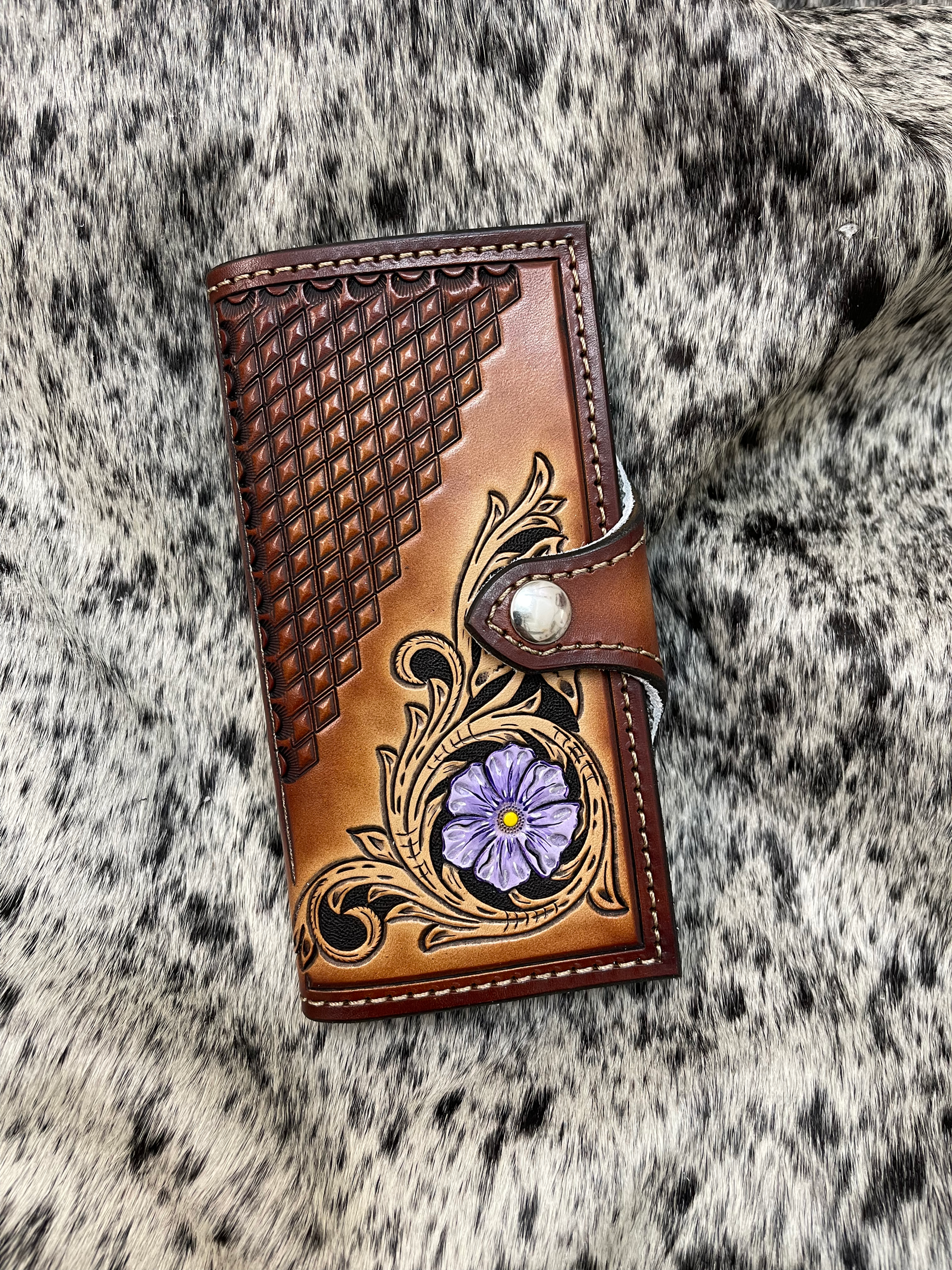 Front view with floral tooling