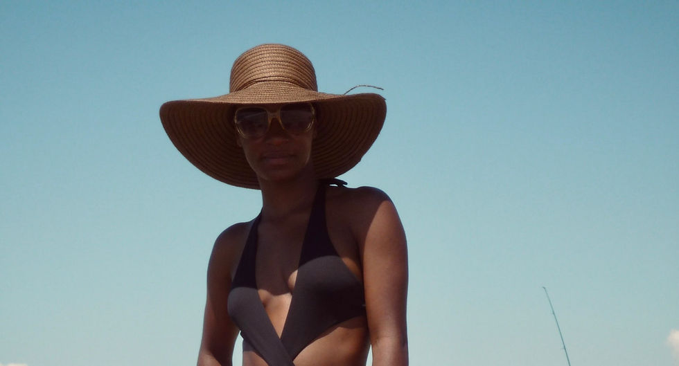 girl at the beach in a swimsuit