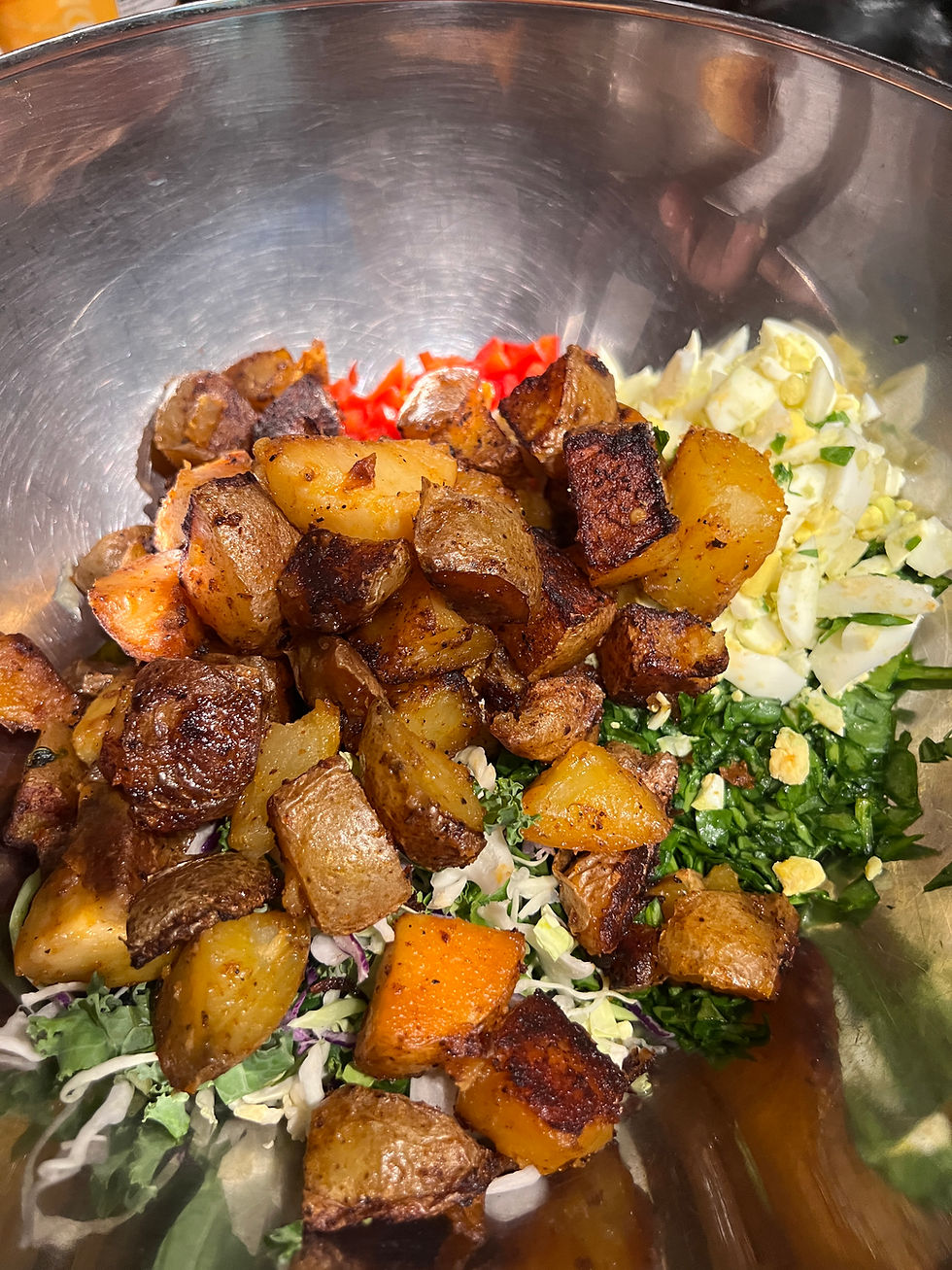 ingredients for a potato salad in a mixing bowl/Renata Poleon